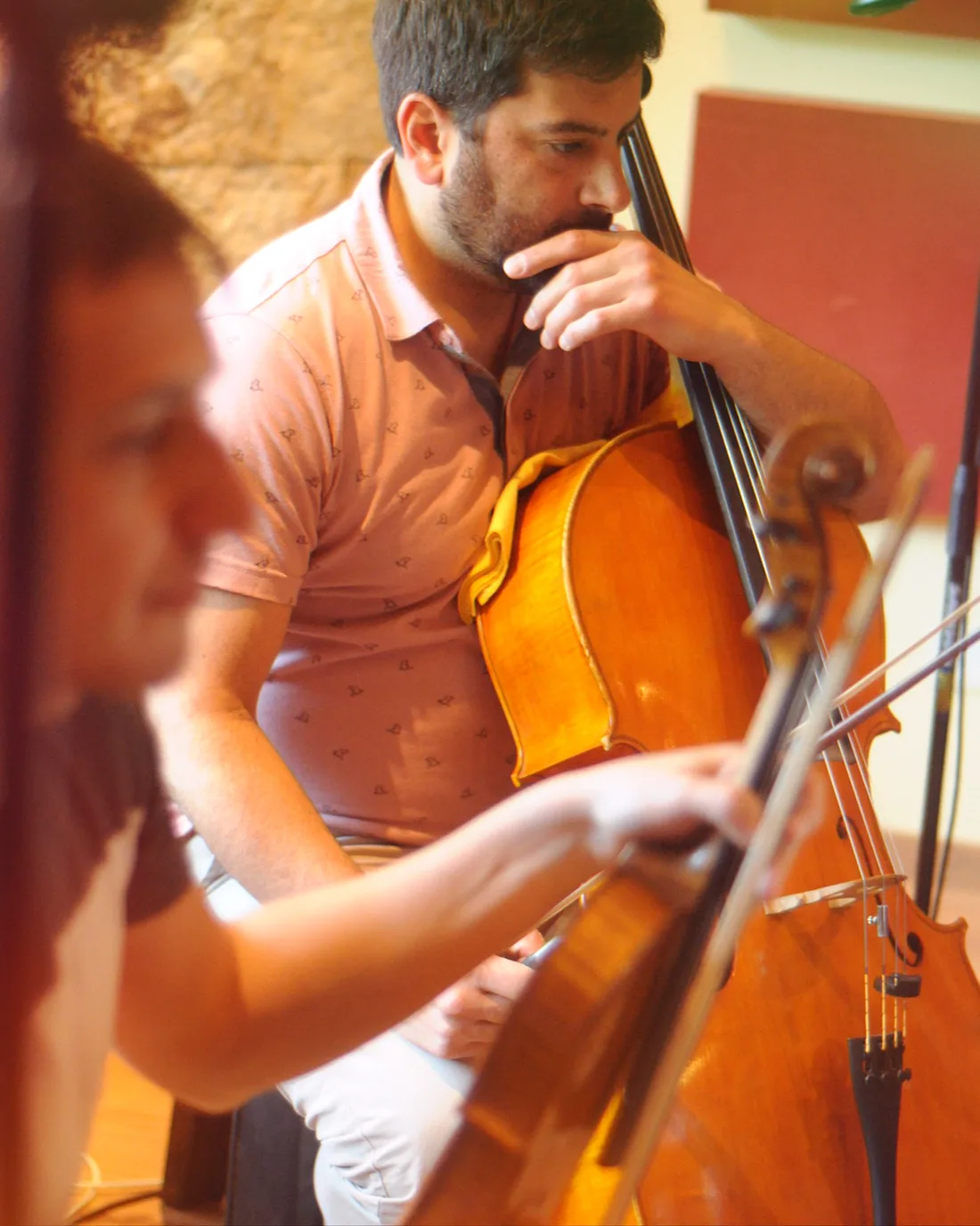 Cellist performing during the string quartet recording